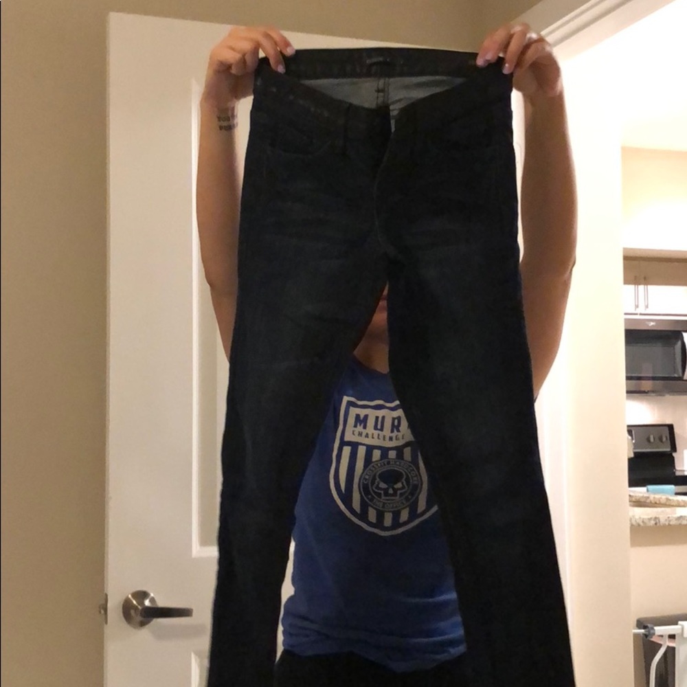 Dark blue jeans with leather waist band